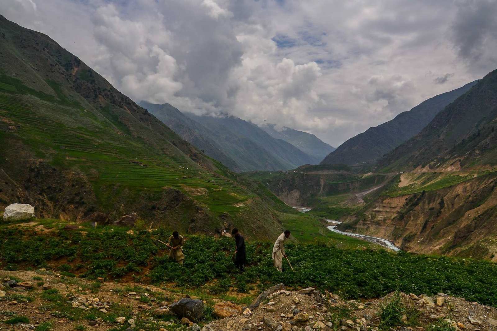 Farmers in terraced fields above the Kunhar river in Kaghan valley