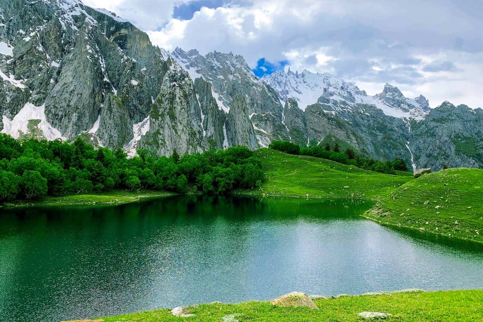 Kutwal lake below granite walls in the Haramosh valley