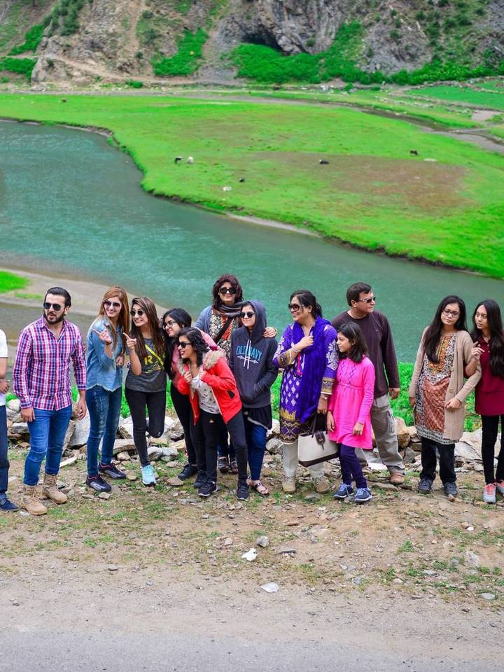 A Travelore group by the river in Kaghan valley