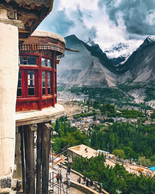A red carved window of Baltit Fort above Karimabad